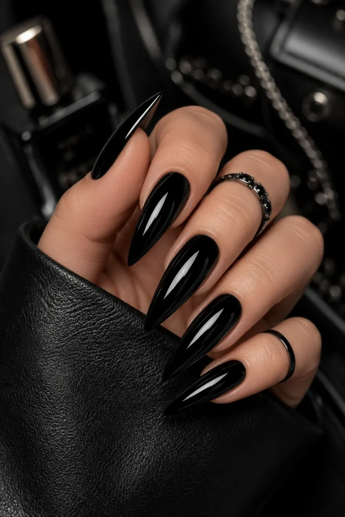 Glossy black stiletto nails with high-shine finish