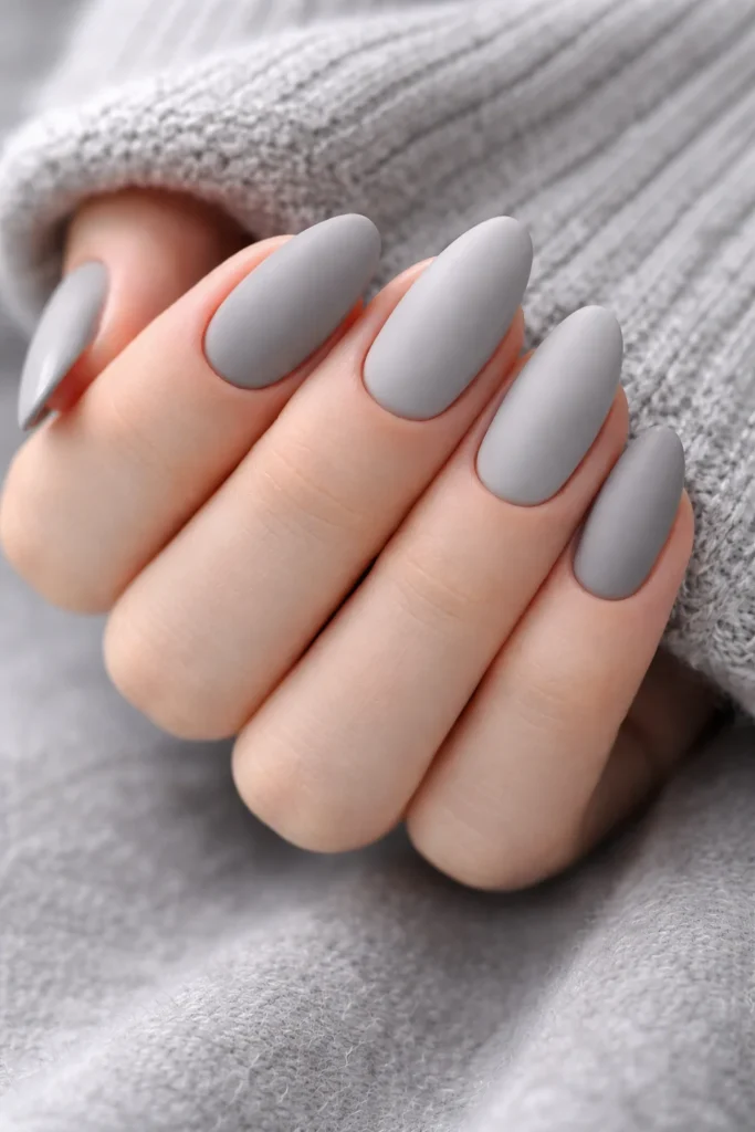Soft grey minimal nails with modern matte finish winter
