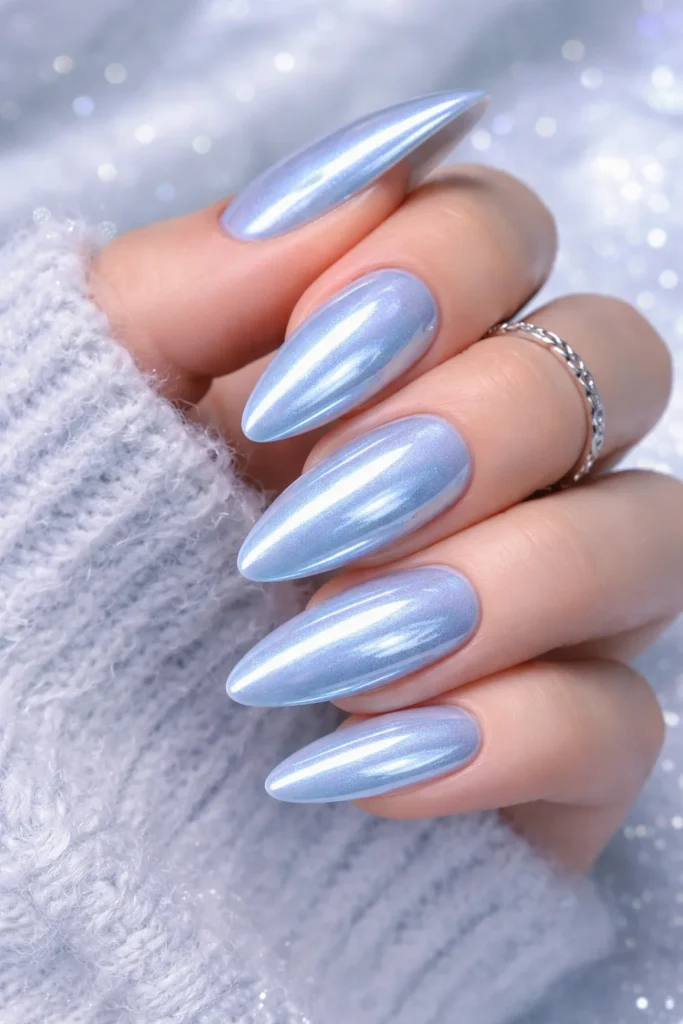 Icy blue chrome nails with frosty mirror finish winter