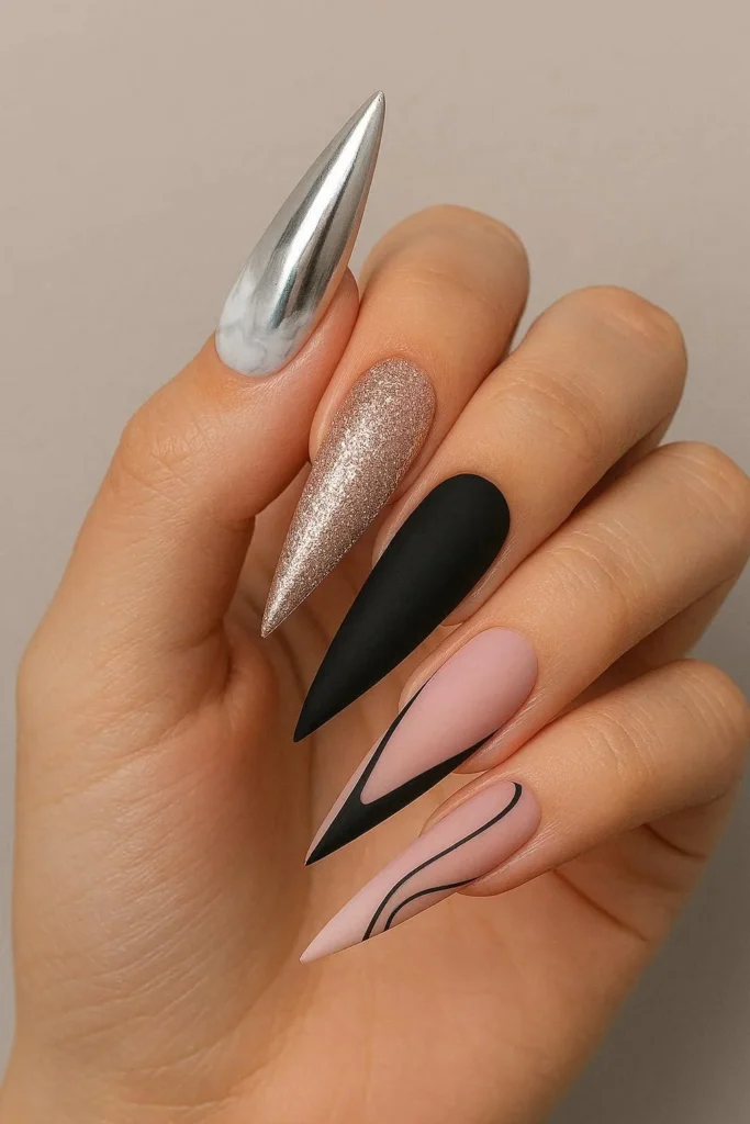  Mixed design stiletto nails with different bold patterns each finger 