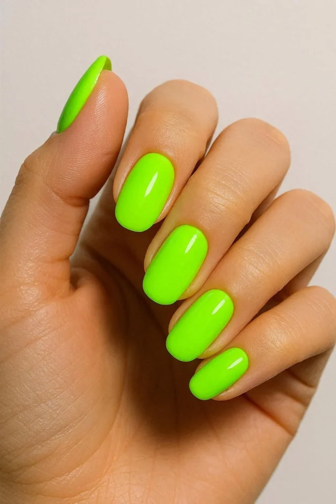 neon pop nails in electric lime hot pink and orange for bold eye-catching look