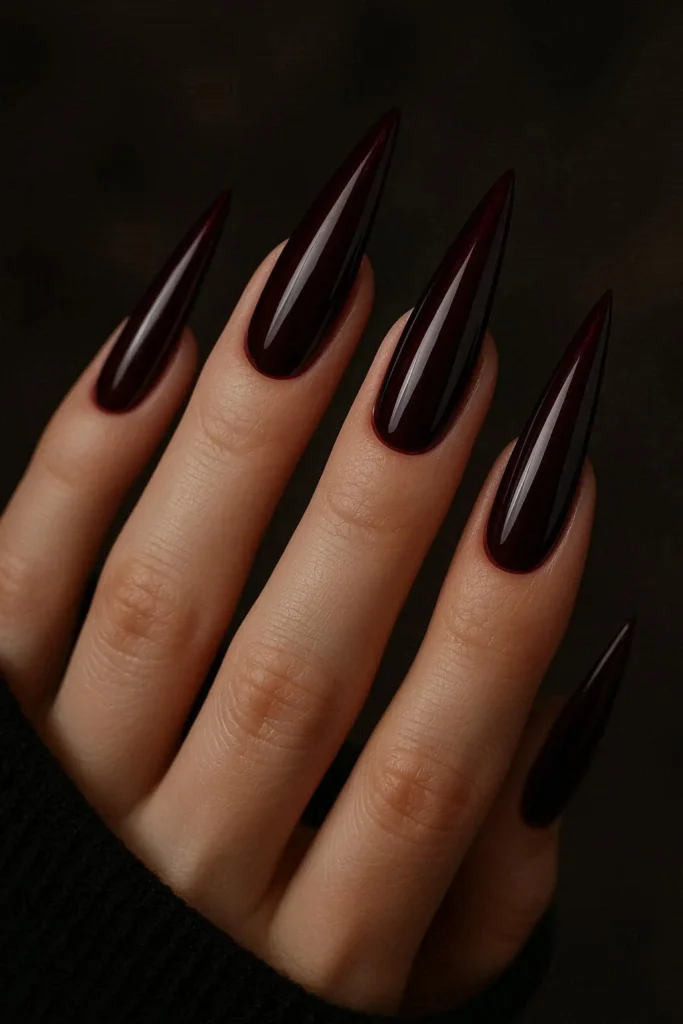 Neon stiletto nails in bright bold eye-catching electric colors 