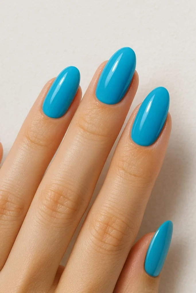  Bright ocean blue nails inspired by tropical beach vibes