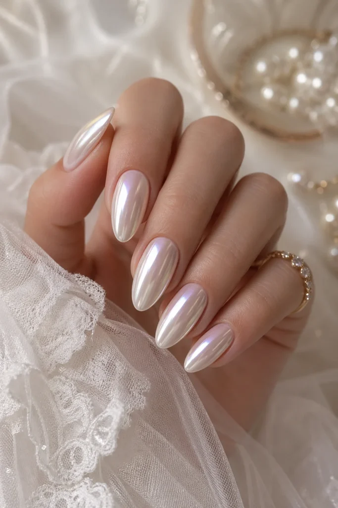 Pearl chrome bridal nails with soft luminous shimmer finish