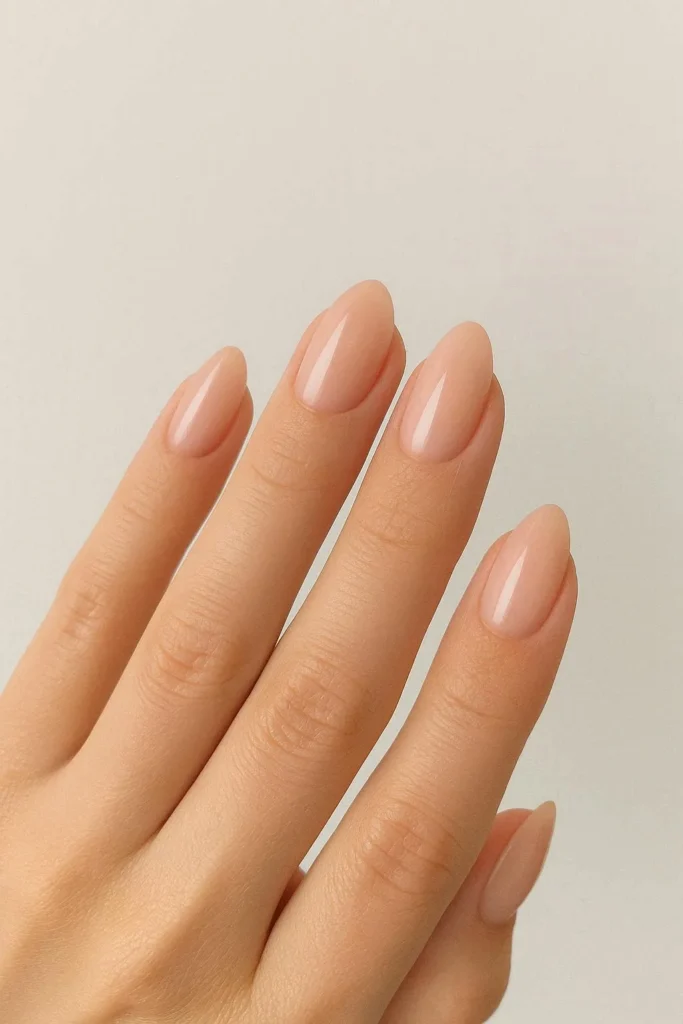 Short almond simple nails in a minimal neutral shade