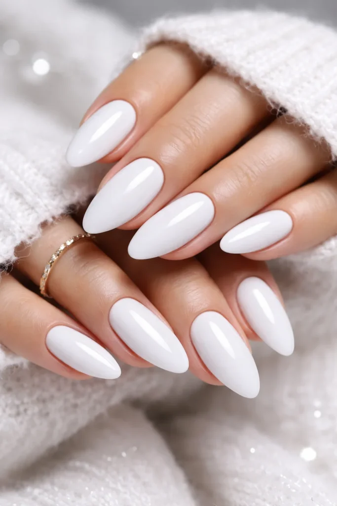Snowy white nails with glossy finish for winter 2026