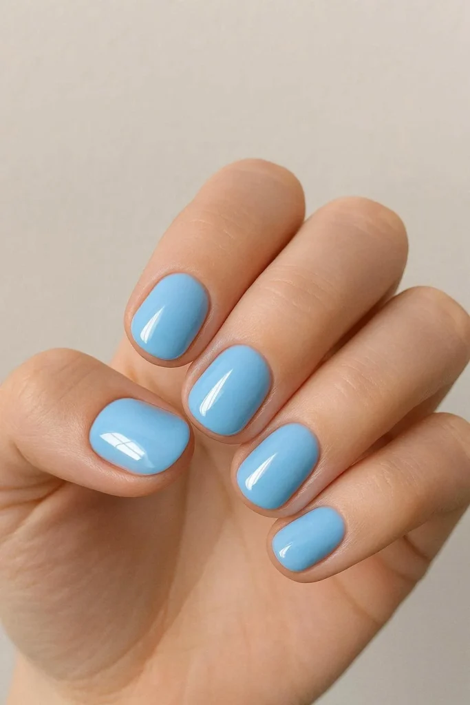 Soft baby blue nails with calm fresh glossy appeal