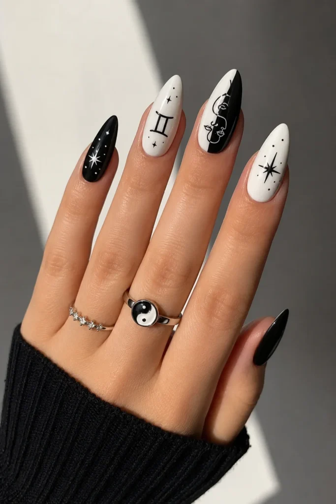 Black and white Gemini nails with bold monochrome duality design 