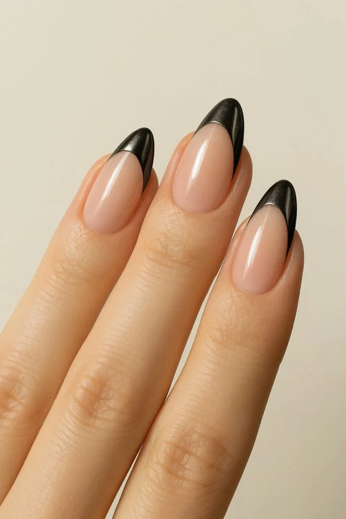 Black chrome French tip nails with mirror like finish