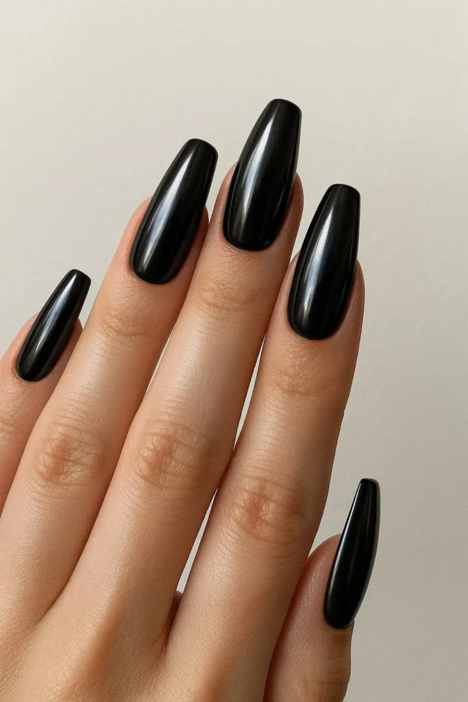 Black chrome nails with dark obsidian reflective metallic finish