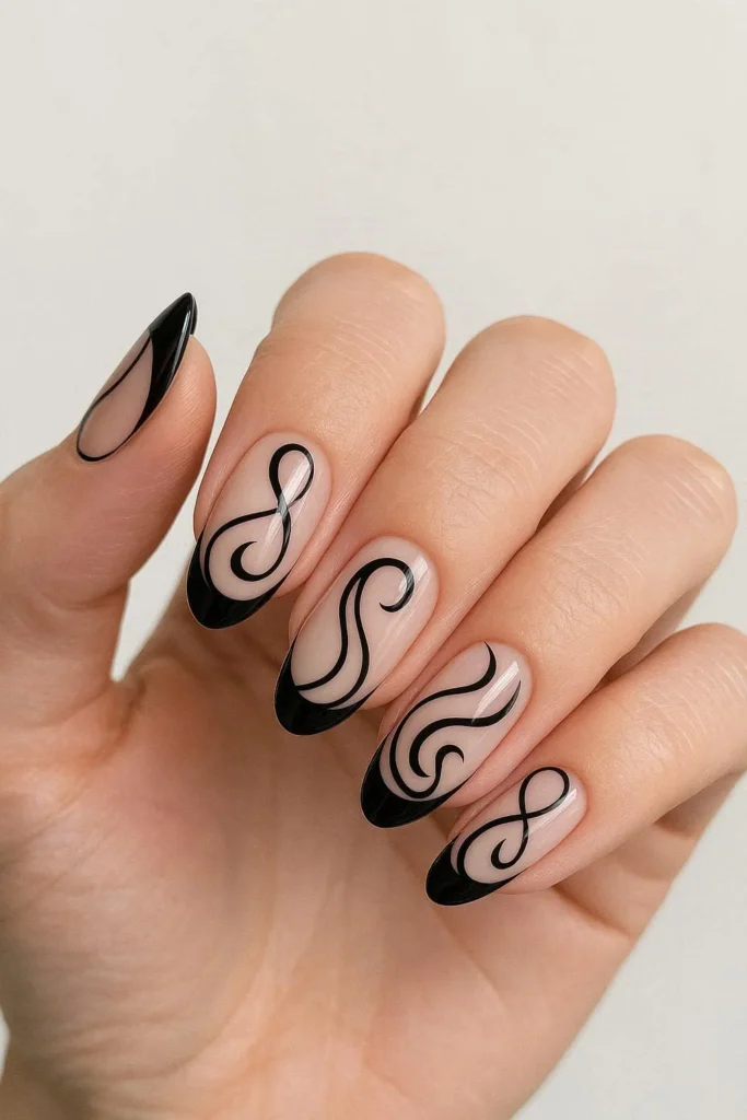 Black French tip nails with hand painted swirl accents