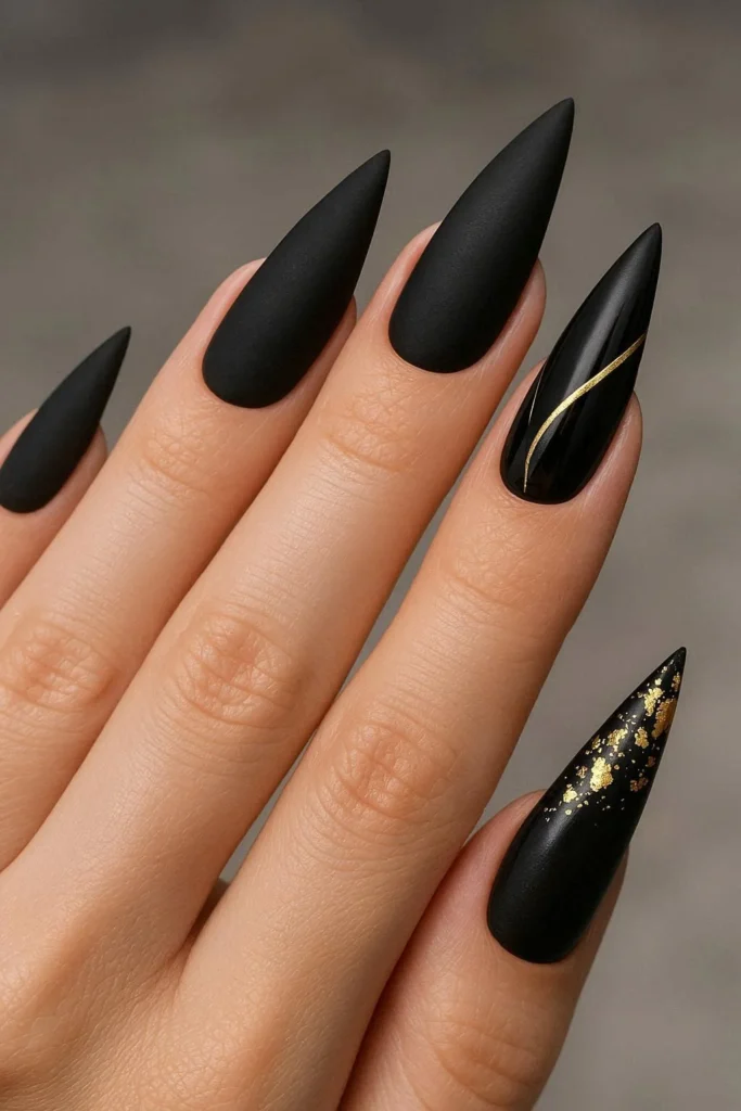 Black and gold nail art for dramatic homecoming manicure 
