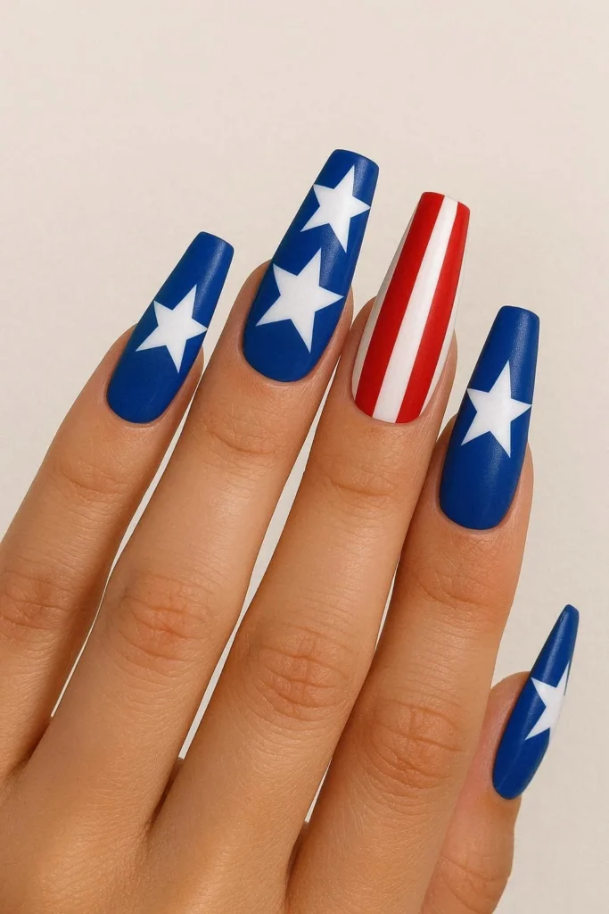 Bold coffin shaped patriotic nails with dramatic holiday art 