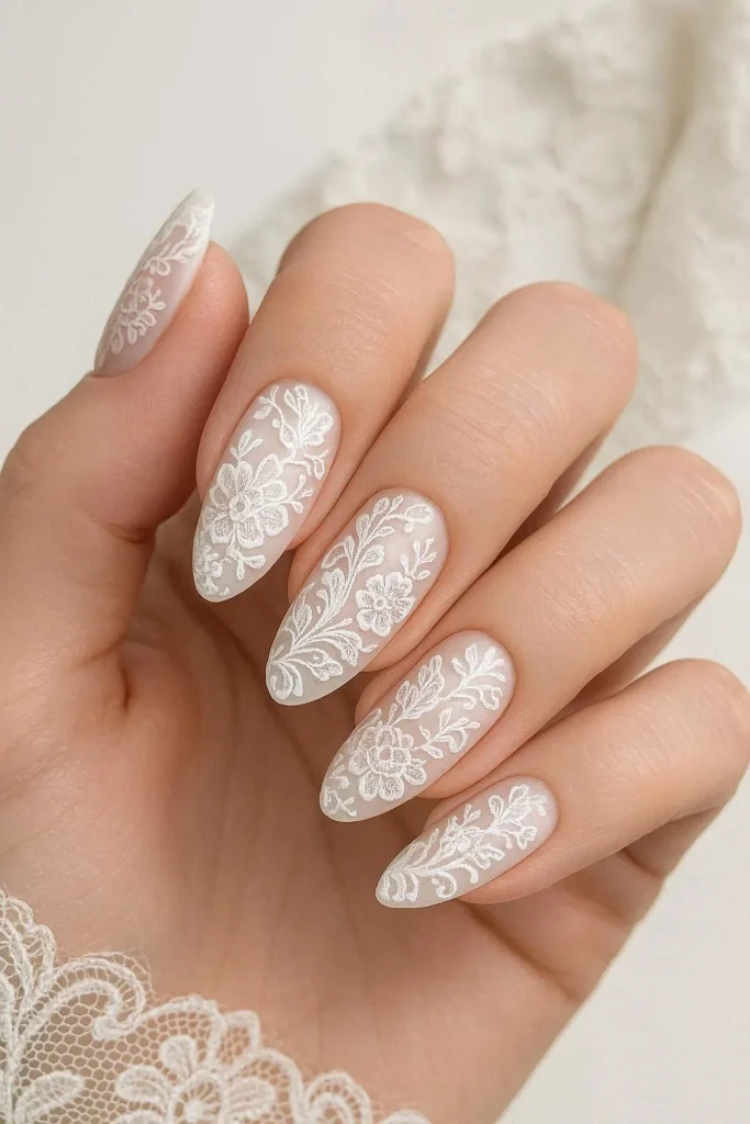 Beautiful bridal lace nails with white floral elegant nail designs