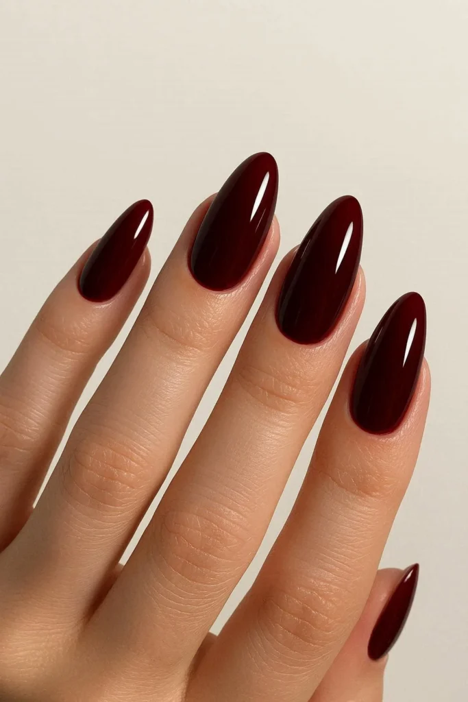 Burgundy graduation nails with deep rich glossy elegant finish