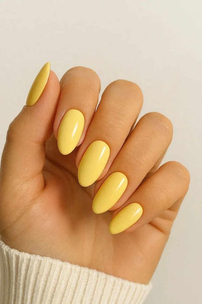 Butter yellow pastel nails for sunny spring days