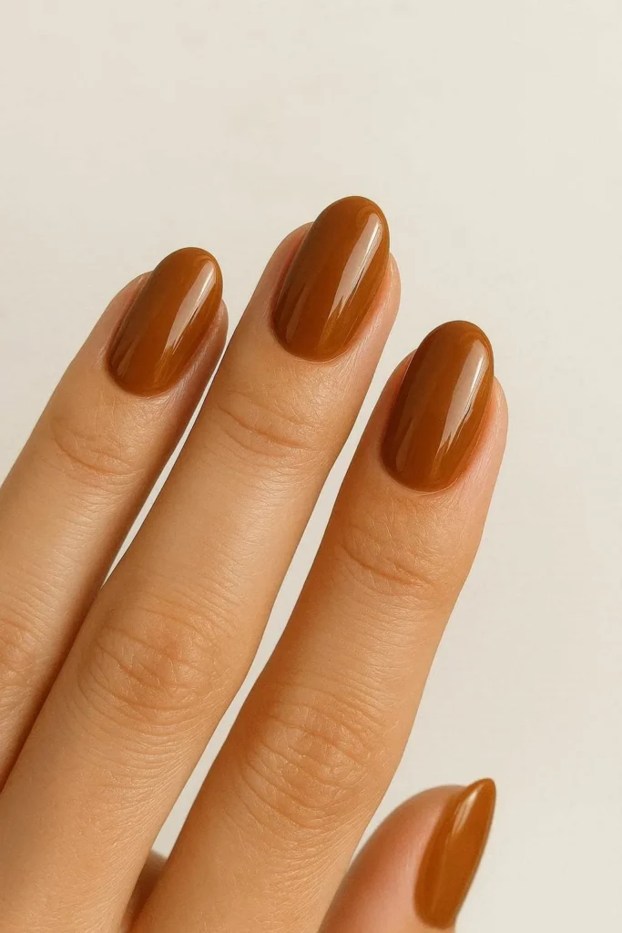 Caramel latte glossy nails for cozy fall season