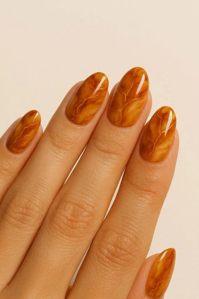 Caramel marble nails warm amber veining Italian stone inspired