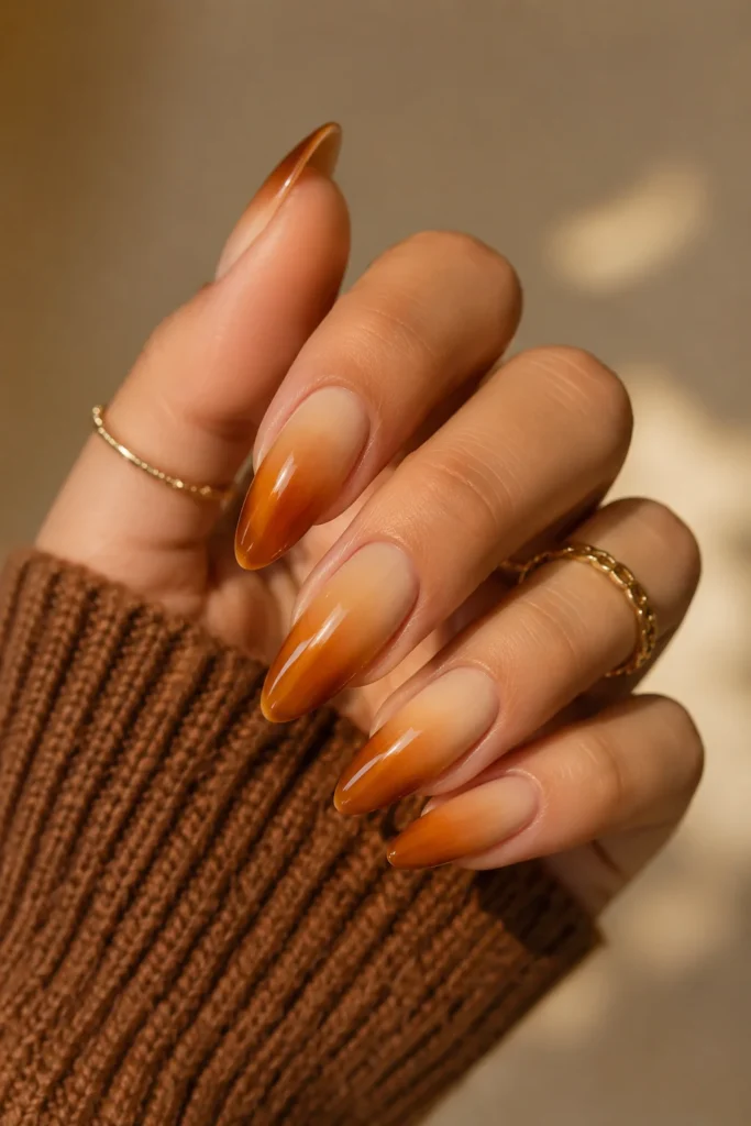 Caramel ombre almond nails blending cream to gold for autumn