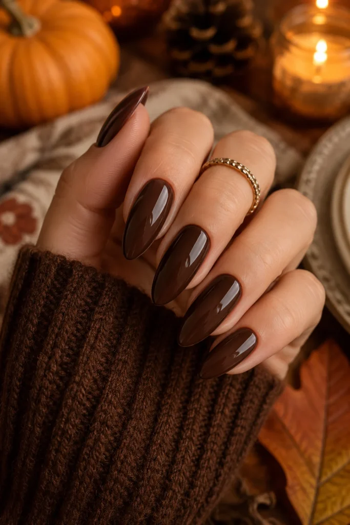 Deep chocolate brown almond nails for autumn Thanksgiving manicure