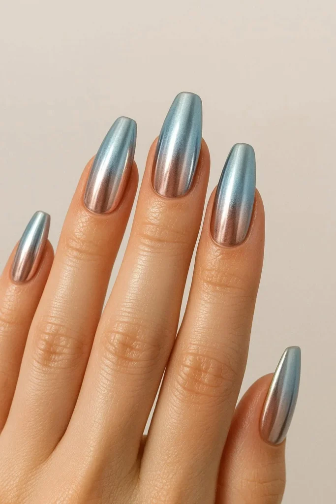 Chrome ombre nails with blended metallic gradient finish