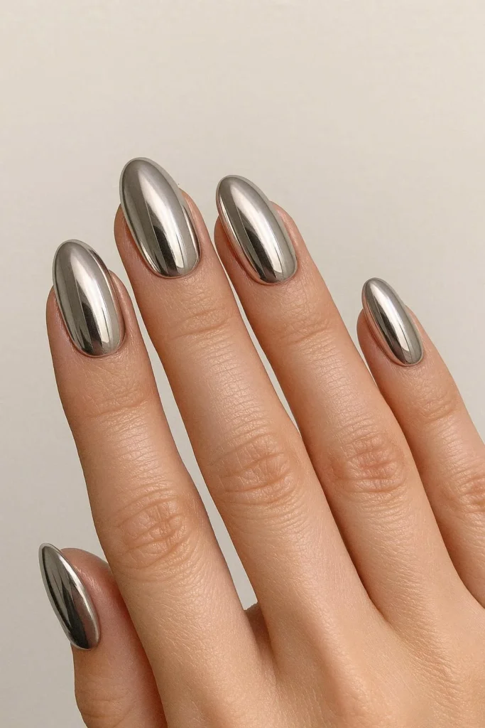  Chrome oval nails with mirror silver reflective finish and sleek shape