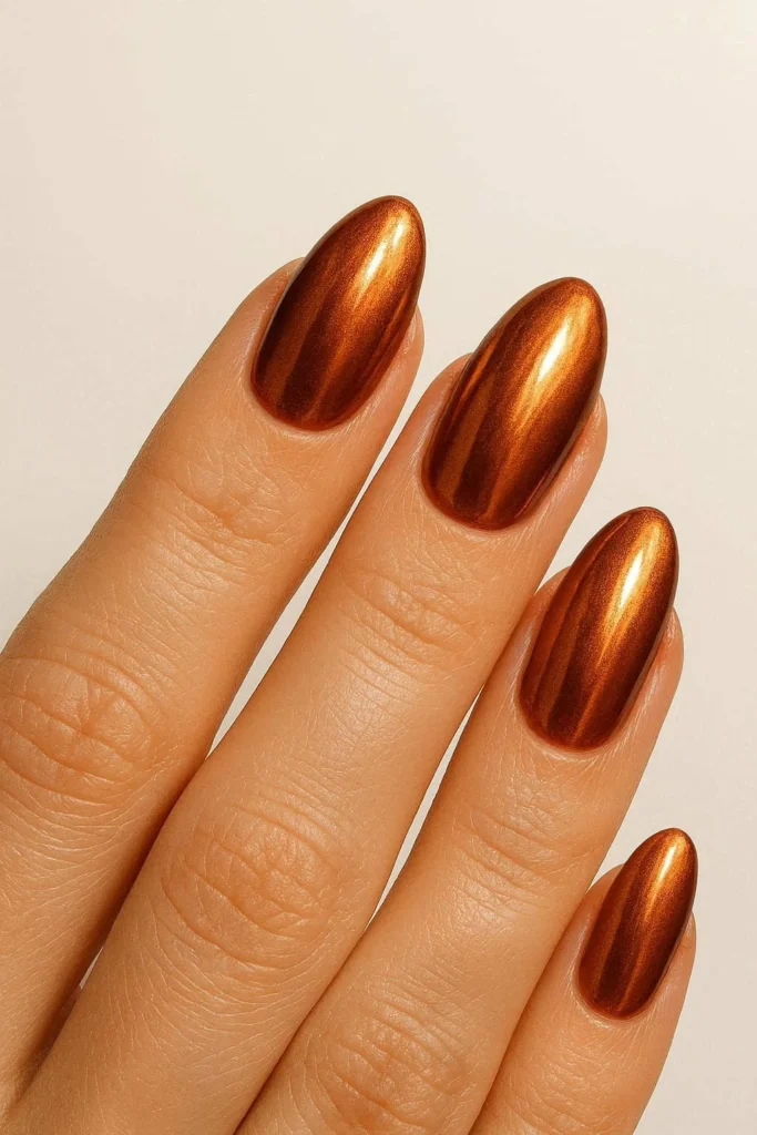 Cinnamon chrome nails warm spiced metallic earthy bronze shimmer