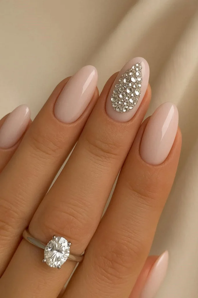 Crystal rhinestone accent engagement nails delicate sparkle detail 