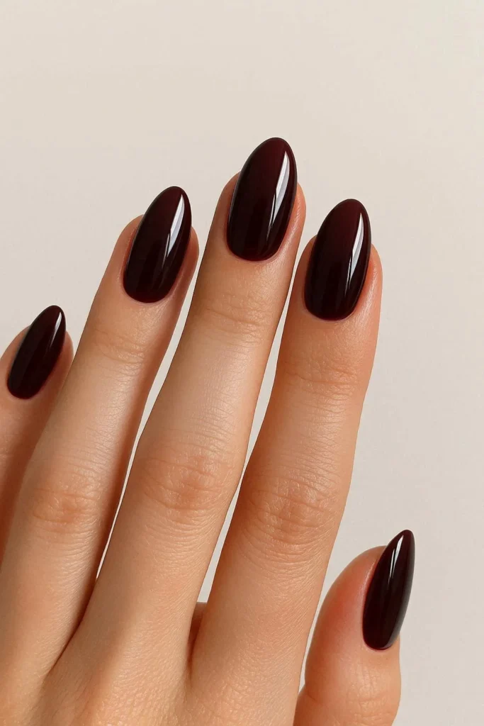 Dark cherry glossy red nails for fall October manicure