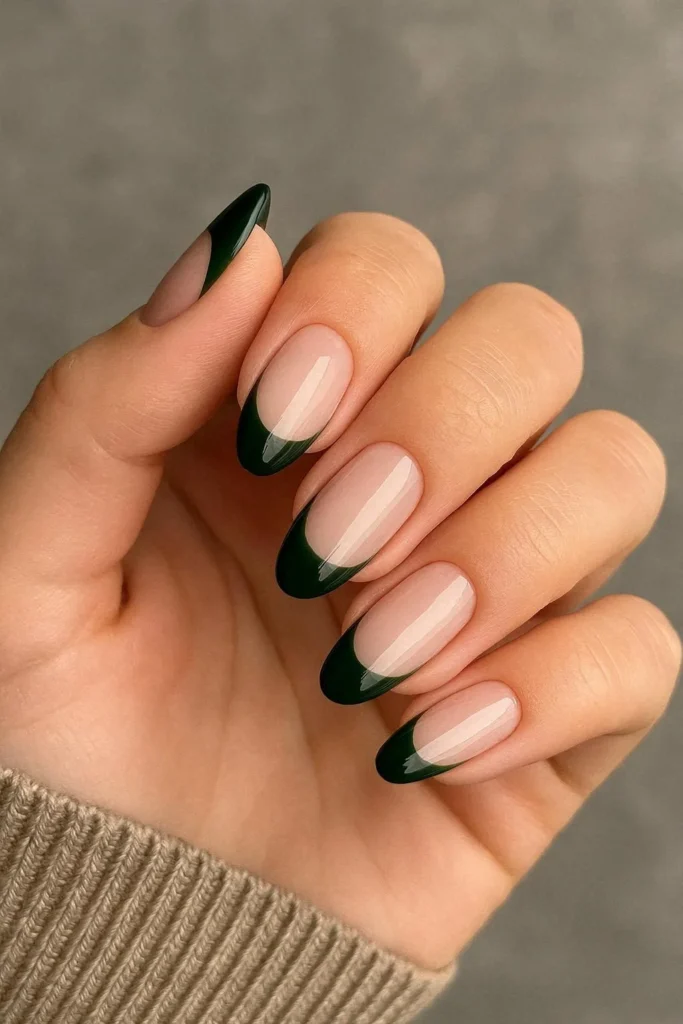 Dark forest green French tip nails with gold line detail