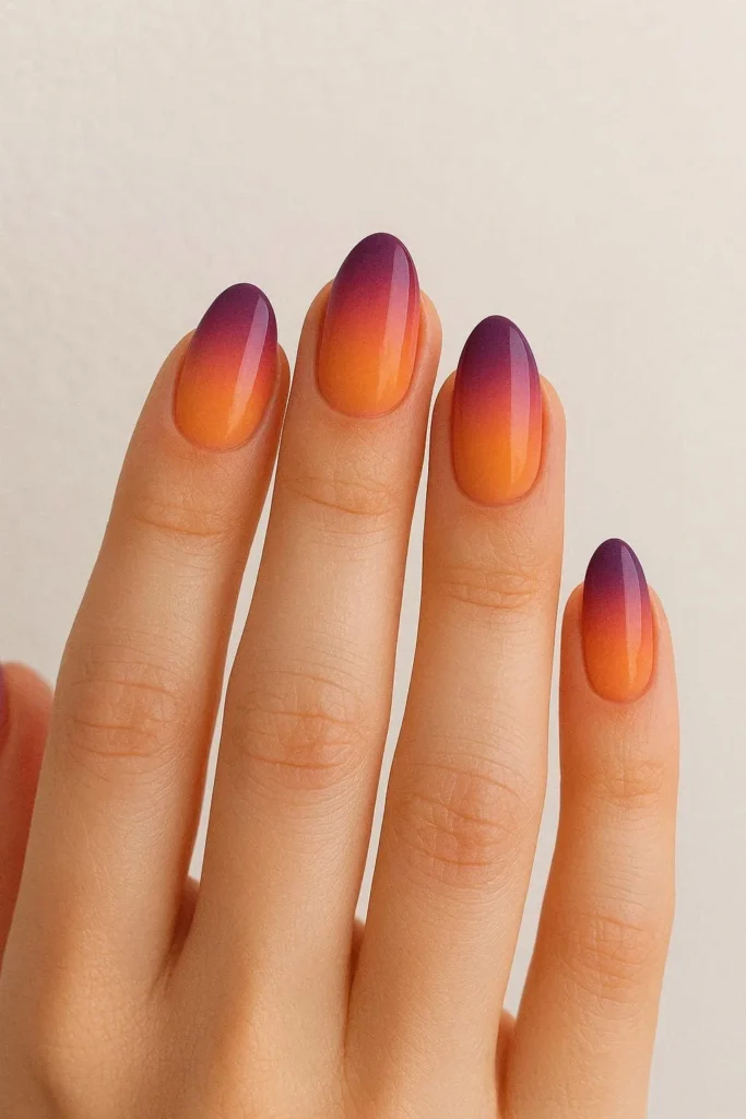  Desert sunset ombre nails in orange pink and purple gradient