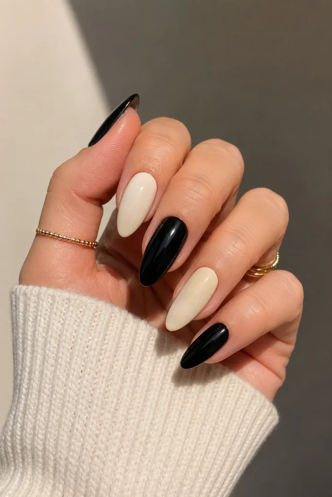 Dual tone Gemini nails with contrasting color blocking design 