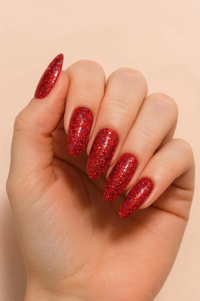 Sparkly glitter 4th of July nails in red silver blue