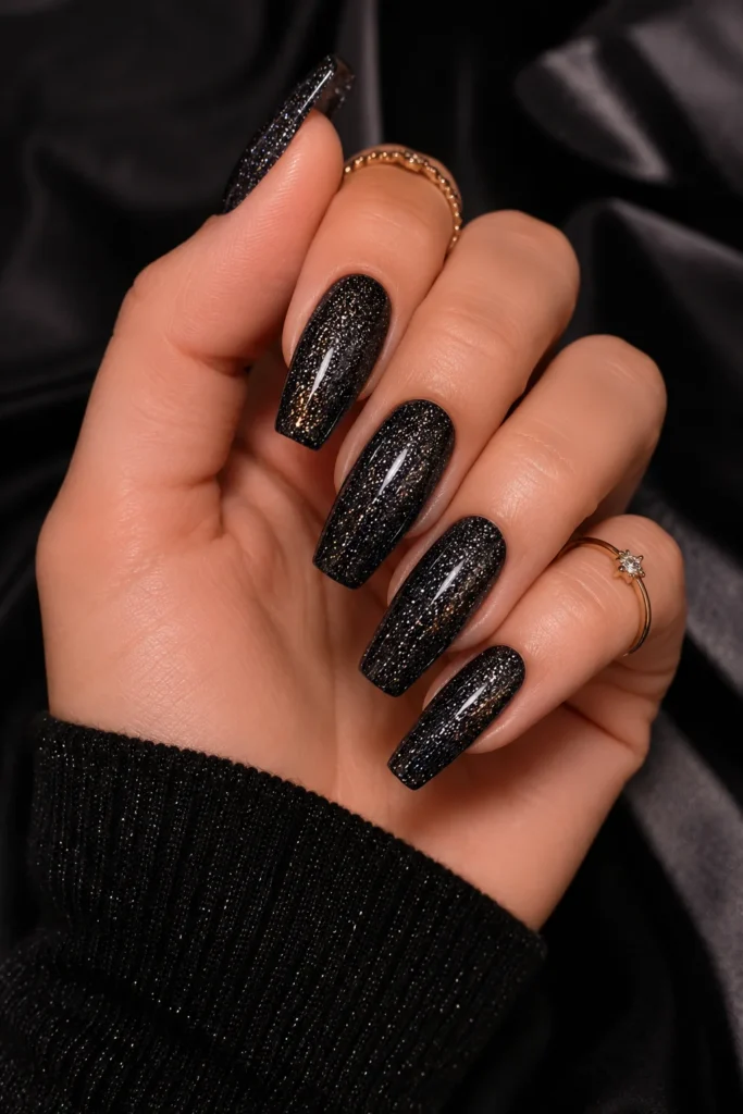 Glitter Gemini nails with sparkly night sky inspired accents