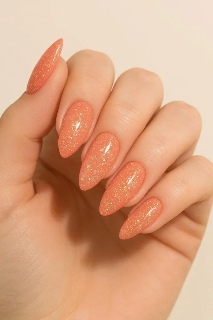 Glitter tropical almond nails with sparkly sun kissed shimmer finish 