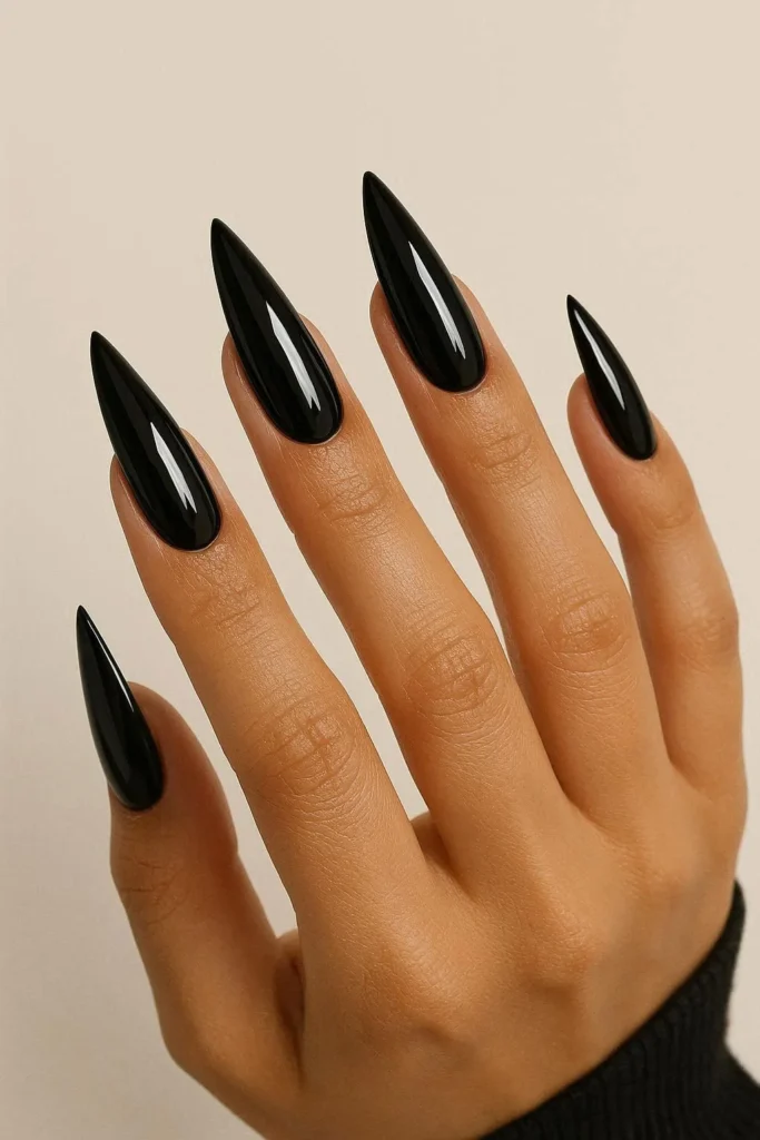 Glossy black baddie nails with sharp high-shine coffin finish