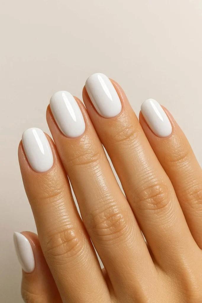Crisp glossy white summer nails for 4th of July holiday 