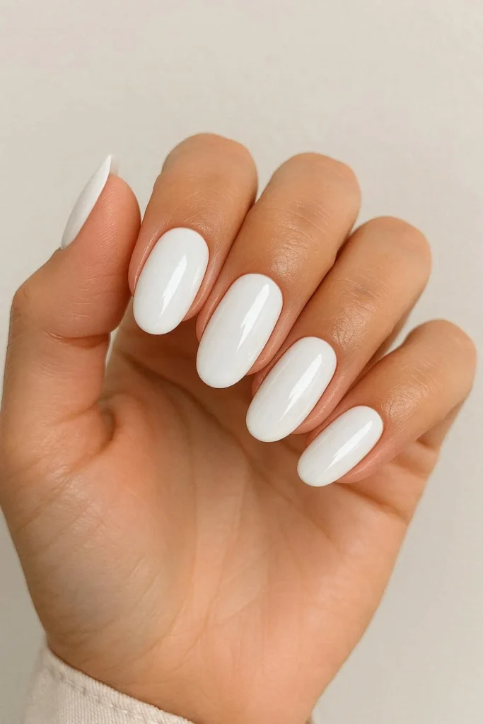Glossy white summer nails perfect for holiday weekend style