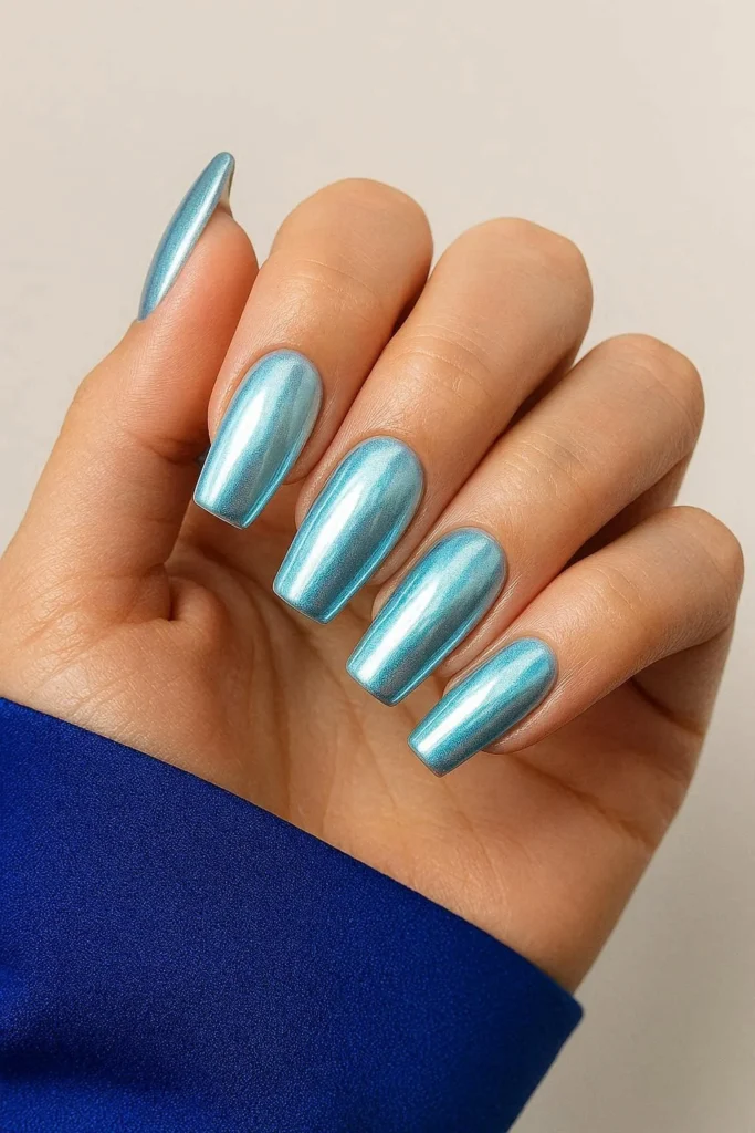 Icy blue chrome nails for trendy homecoming dance night 