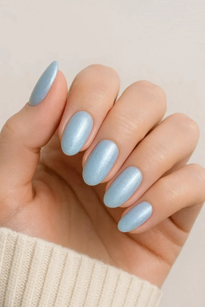 Icy blue nails inspired by snowy winter landscapes