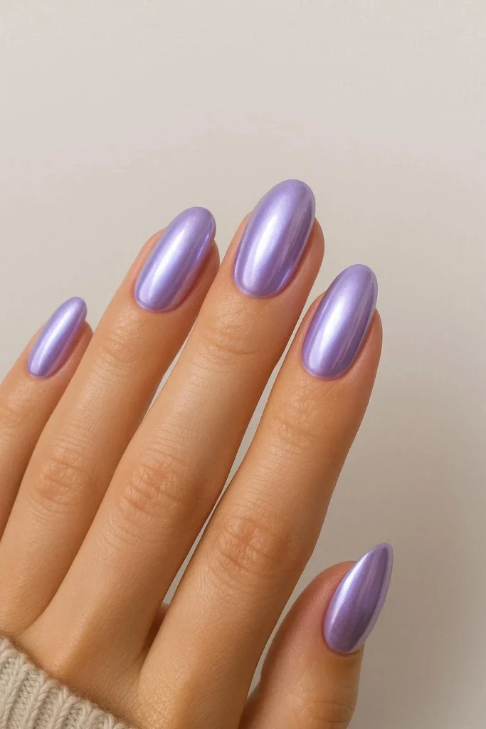 Lavender chrome nails with reflective purple shine finish