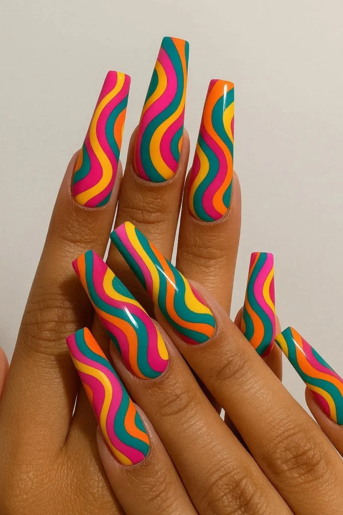 Long coffin pucci nails with dramatic bold abstract swirl patterns