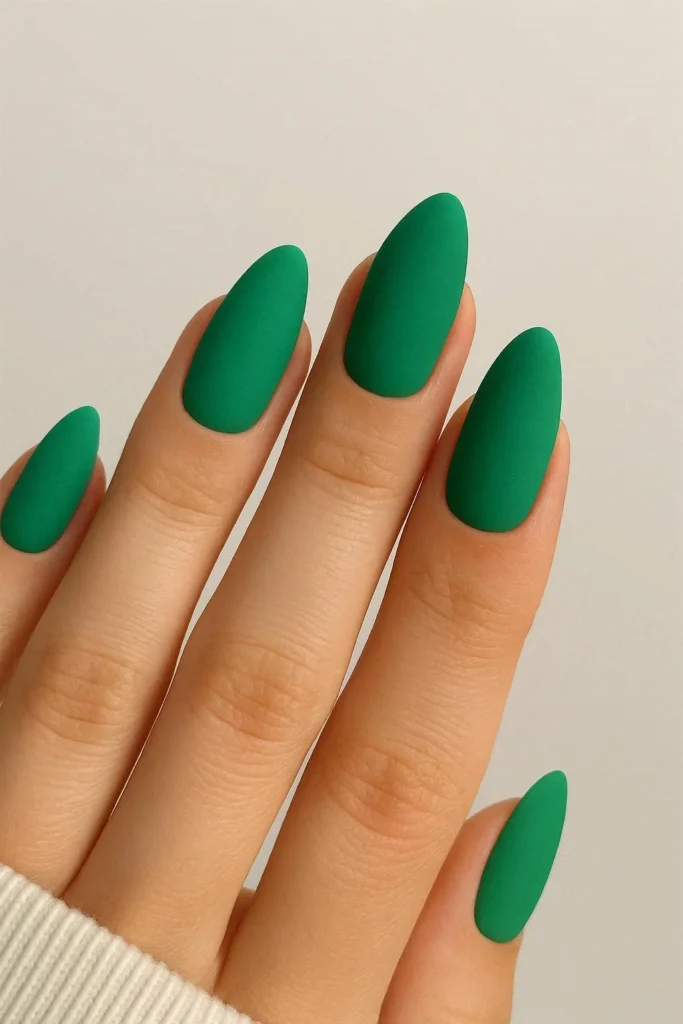 Matte tropical almond nails in bold turquoise coral and green finishes