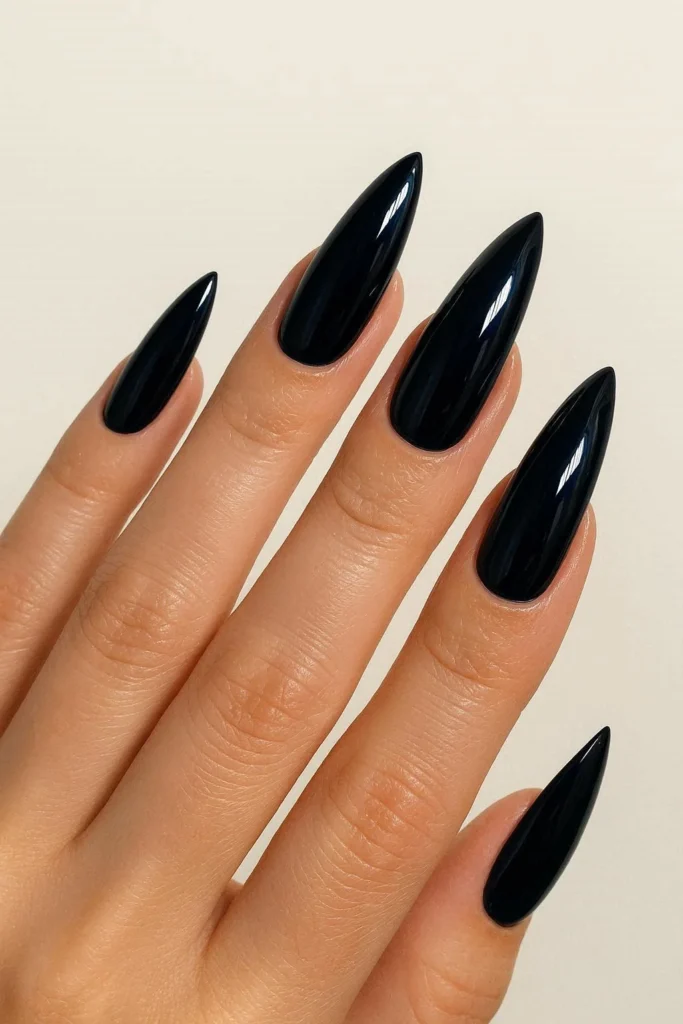 Midnight navy glossy dark nails for October fall manicure