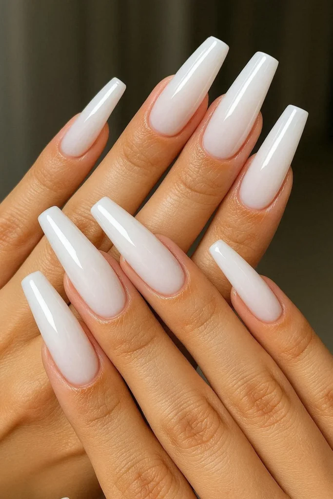 Milky white coffin nails for sleek homecoming formal look 