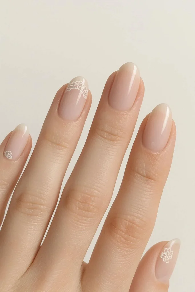 Clean minimal lace nail art with subtle delicate lace nail design 