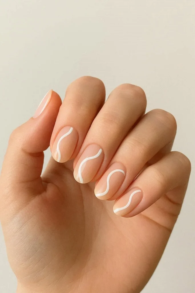  Minimal swirl nails with soft curved lines on pastel base