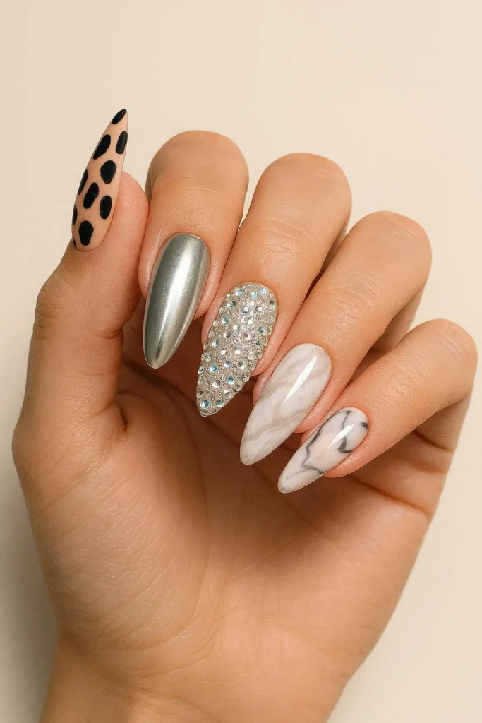 Mixed design baddie nails with different bold patterns on each finger