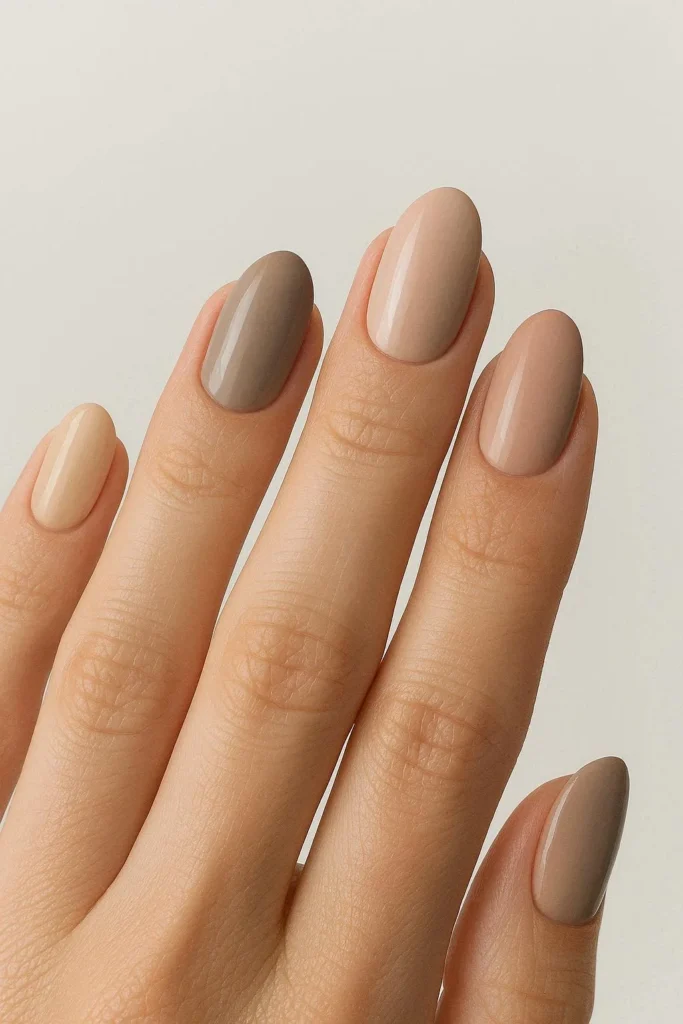 Neutral mix oval nails with different nude tones on each finger