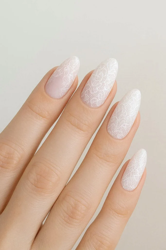 Dreamy ombre gradient nails with delicate lace overlay nail design